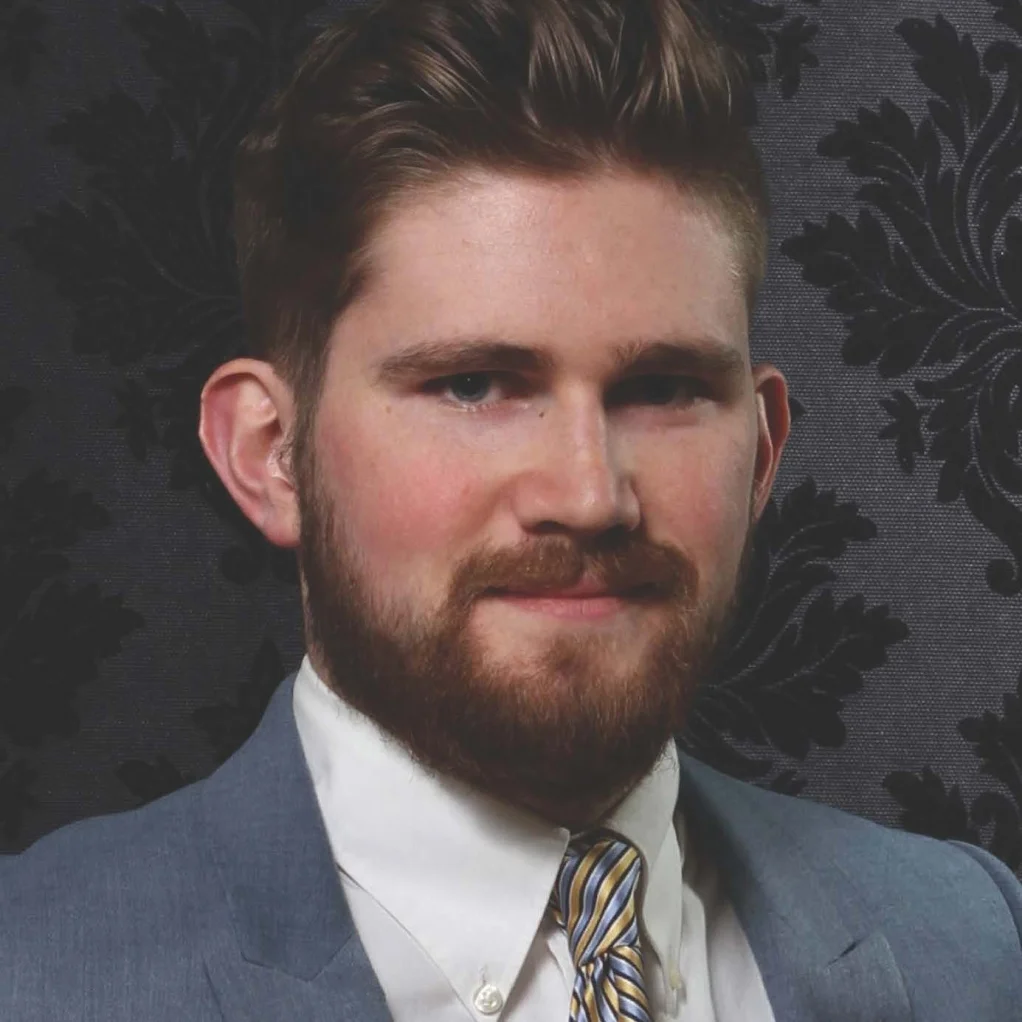 Tyler J. Malloy