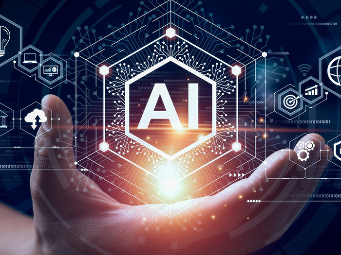 Hand holding digital art with the letters AI